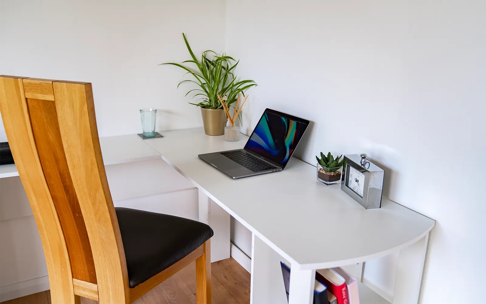 An interior shot of a garden room set up as a home office